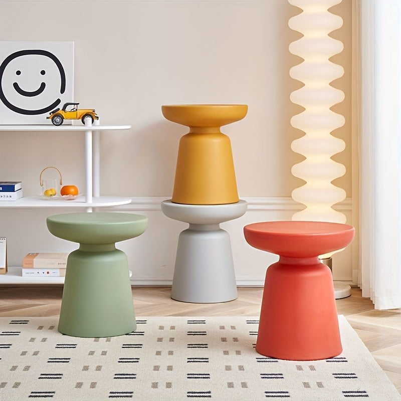 Creative Round Coffee Table for Small Apartments, Suitable for Living Rooms, Featuring a Plastic Design That Complements Corner Sofas.