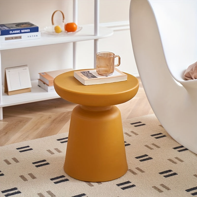 Creative Round Coffee Table for Small Apartments, Suitable for Living Rooms, Featuring a Plastic Design That Complements Corner Sofas.